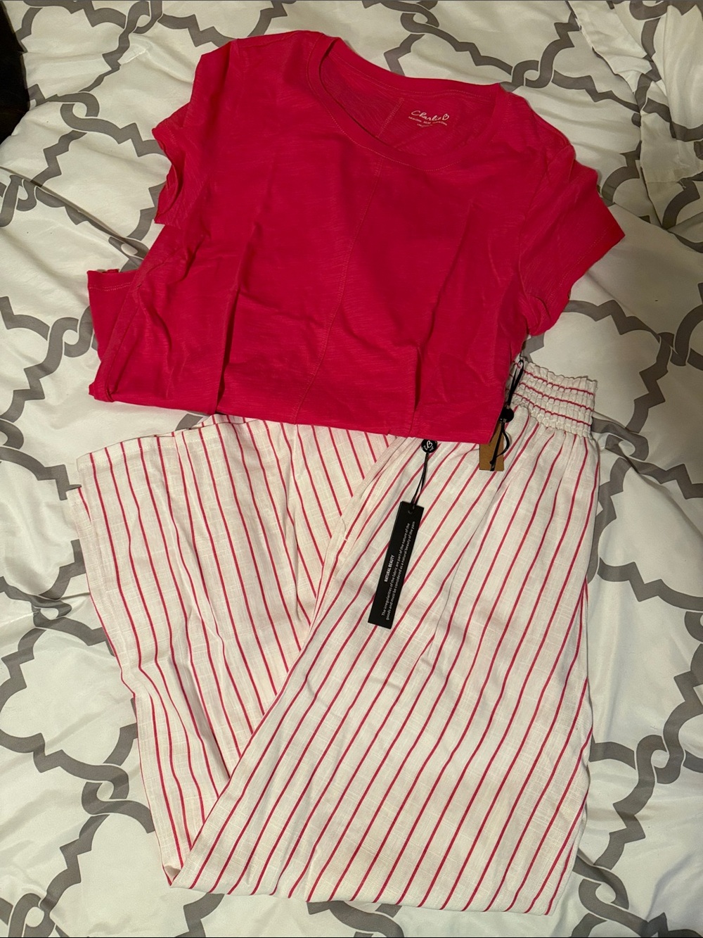 Beach outfit with flowy pants and matching pink top